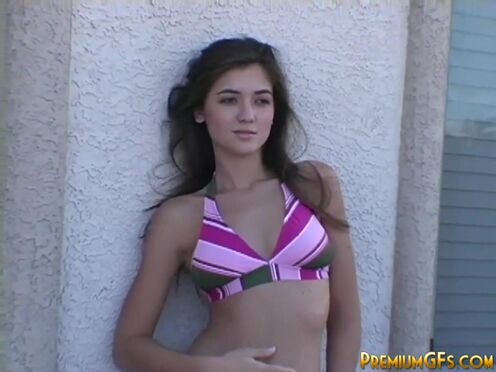 Stripping teen babe takes off her bikini