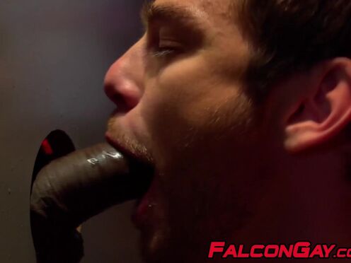 Two lustful guys blowing each others dicks through glory hole