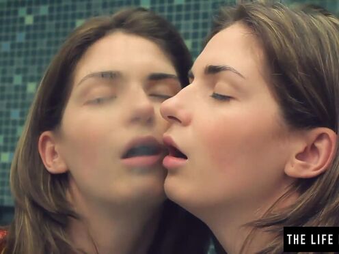 Hot brunette watches herself in the mirror as she masturbates