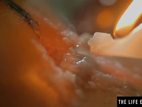 Hot brunette squirting as she fucks herself with a lit candle