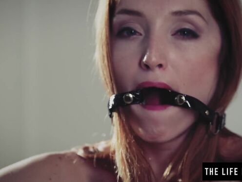 Nipple clamps & ball gag make a horny redhead cum hard