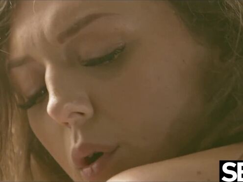 Watch this charming brunette wake her lover with a kinky sex game