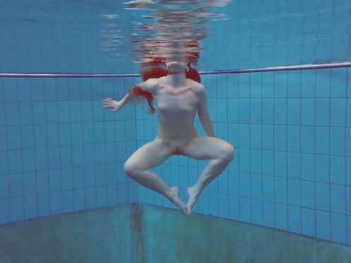 Beautiful Polish teen Alice swimming without clothes on