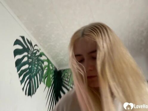 Blonde chick is on her knees & giving a blowjob