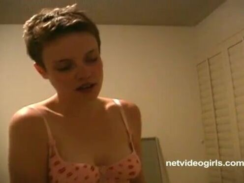 Short haired lady undressing for her first casting