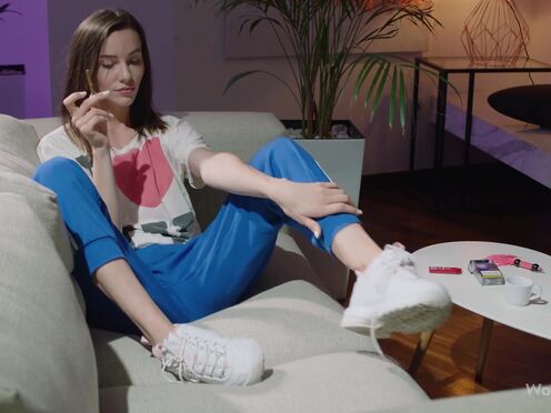 Pretty babe Adel Morel relaxing on the couch & playing with herself