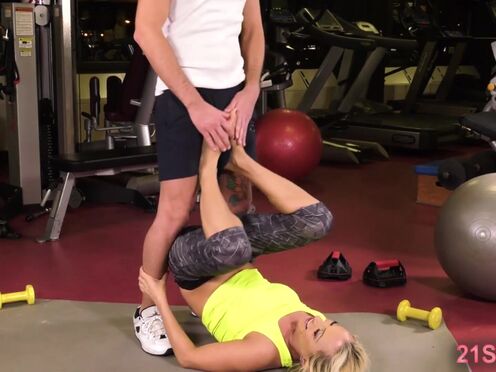 Blonde fitness instructor hardcore training