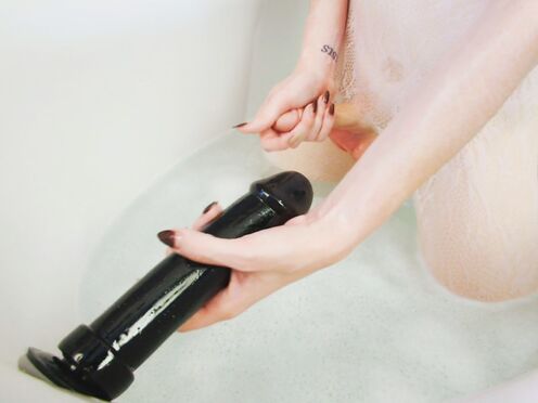 Huge ebony dildo in TS butt