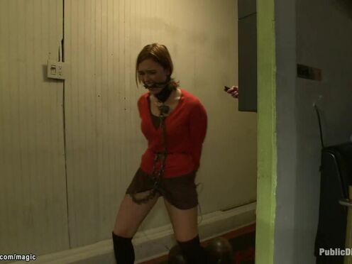 Slave pulling steel ball in public