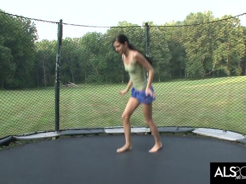 Skinny brunette Tamara Jade masturbated on trampoline