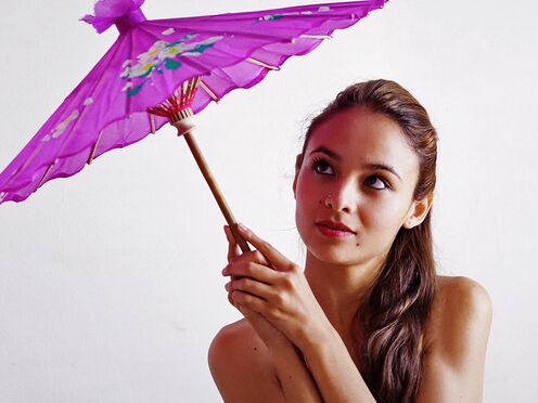 Fedra toying her cunt with a purple parasol