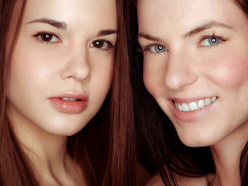 Eileen Sue eats Baby Jewel's muff