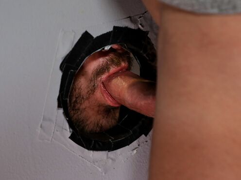 Gay Couple Having Fun At A Public Gloryhole