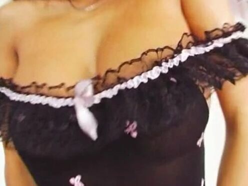 Model Linda brings her large tits & rubs her beaver
