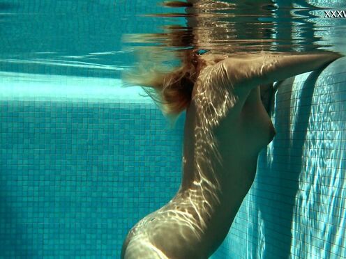 Serbian beautiful babe swims naked underwater