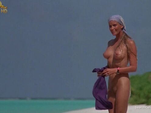 Beautiful Bo Derek showing off her bushy snatch at the beach