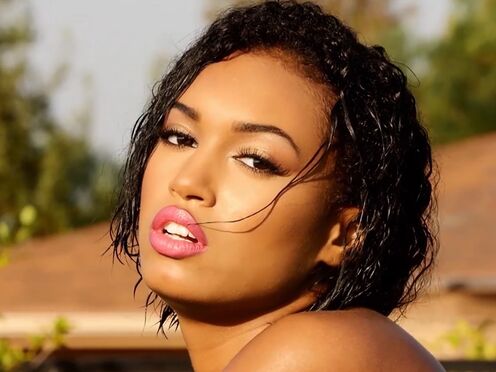 Glamorous all natural black Noelle Monique gets naked at the pool outdoor