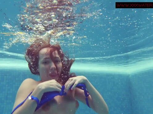 Lina Mercury Russian huge boobs pornstar enjoys swimming pool