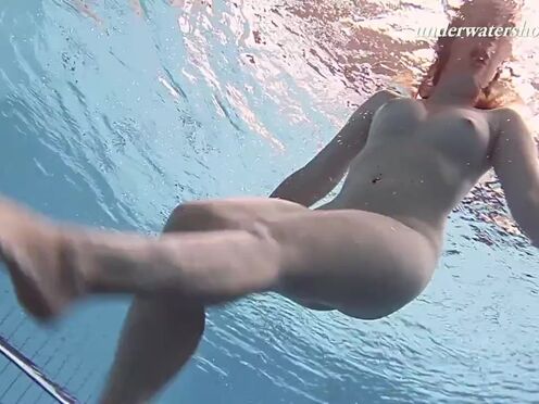 Lenka enjoys nude erotic hot swimming