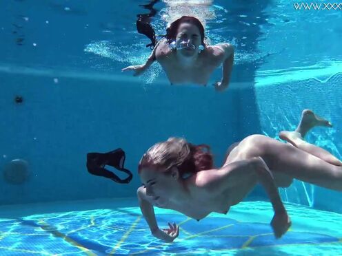 Jessica & Lindsay swim naked in the pool