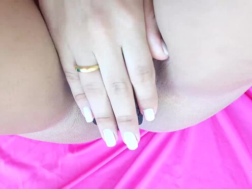 Stroking her heavy shaft outdoors