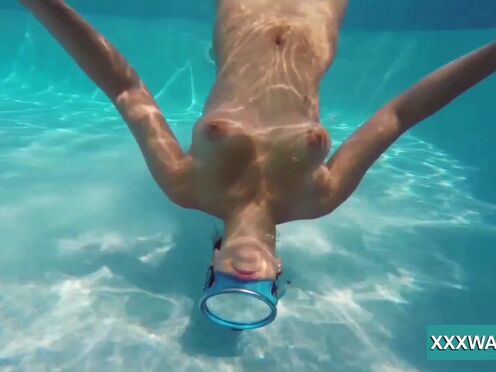 Hot Candy swims & strips nude underwater