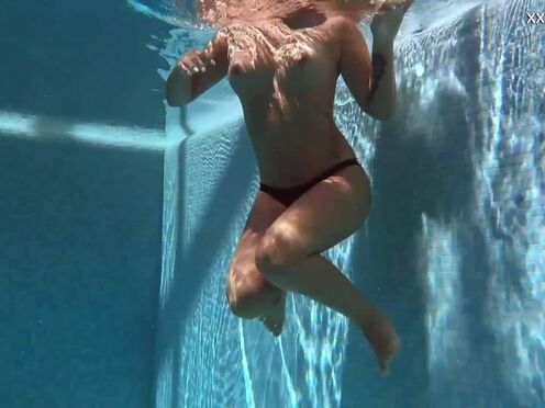 Enjoys her sweet sexy body in the pool her name Puzan Bruhova