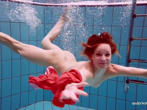 Hot naked twat Avenna swims nude in the pool