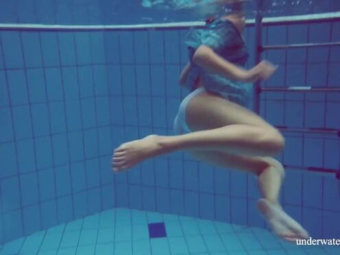 Hot tight teen Marusia swims naked underwater