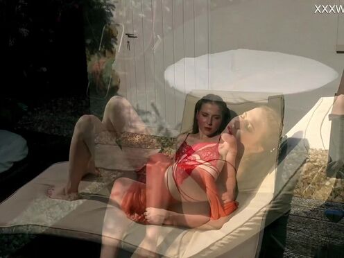 Kim Nadara spreads her legs really wide on the beach