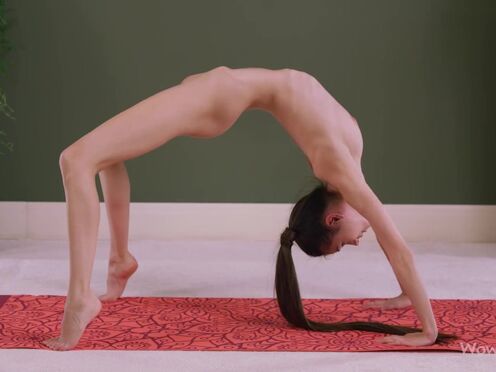 WOWGIRLS Bombshell model Leona Mia performing some yoga exercises absolutely naked