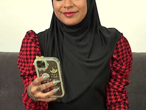 Adorable female in hijab had a lot of fun