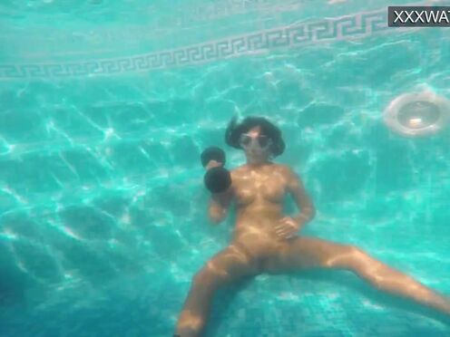Amelie Bruna tasty brunette with huge tits in the pool