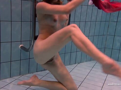 Hungarian sexy girl Dona enjoys being naked in the pool
