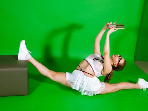 Talented naked gymnast Kim Nadara spreading legs