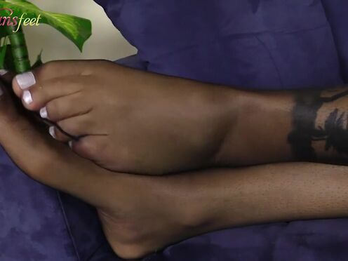 Blonde tbabe shows her feet in black nylons