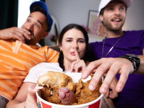 Raj enjoys Tranny Bailey's chicken at game night