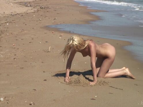 Naked Nymph Agnes Gets Her Nice Butt Covered In Beach Sand!