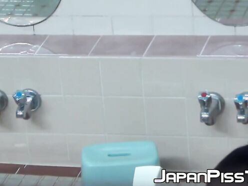 Playful Japanese chicks filmed pissing while taking a shower