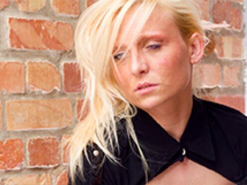 Cougar In A Policewoman Uniform With Small Breasts
