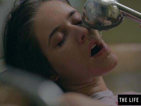 Puffy nippled girl masturbates with a while half