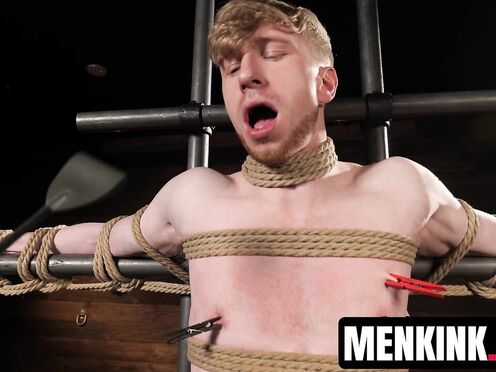 Kyler Drake makes Jesse Stone bite a gag as he drips sexy wax over him