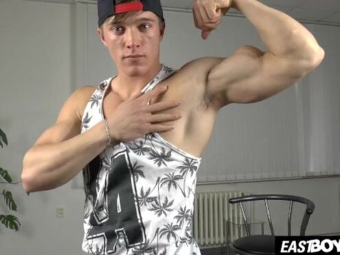 Handsome twink Larry McCormick flex his abs