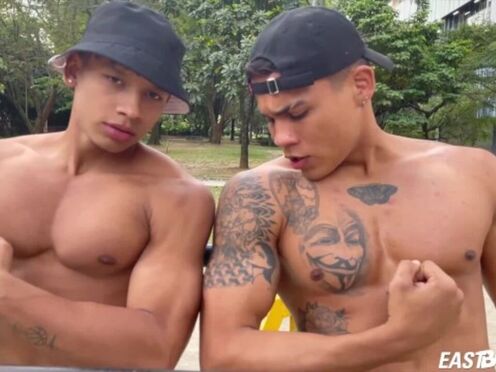 Two sexy latino guys show their muscles