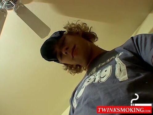 Blonde twink Casey Wood jerks off his dong while smoking