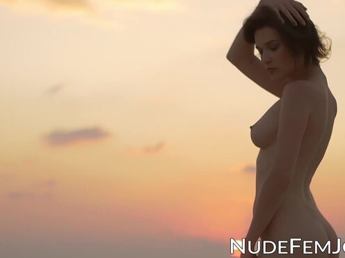 Nubile is teasing by opening her legs