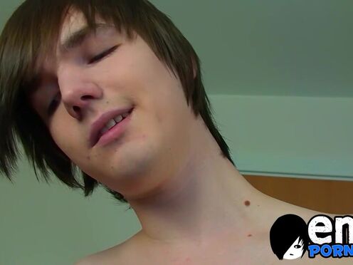 Lusty emo twink jerks off his huge cock & sprays big load