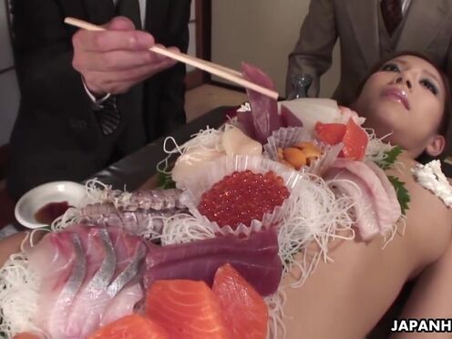 Sucking on the assistant's nipples